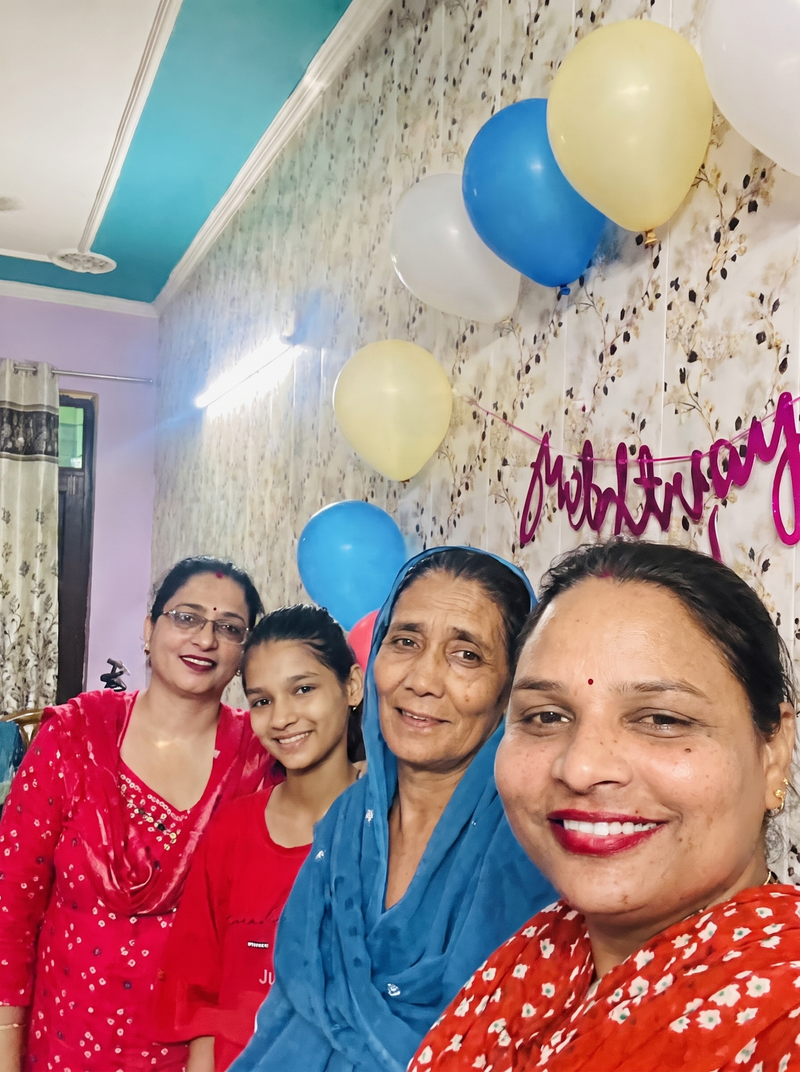 Multi-generation family selfie celebration
